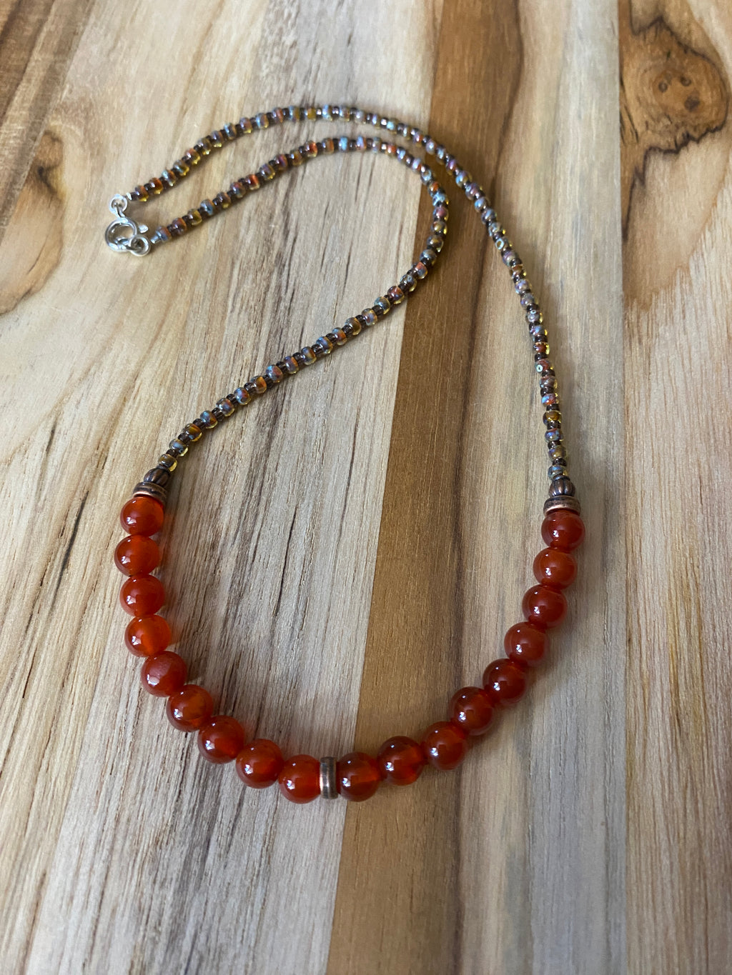 Carnelian Beaded Necklace with Copper and Seed Beads 16”. 6mm beads with seed beads.