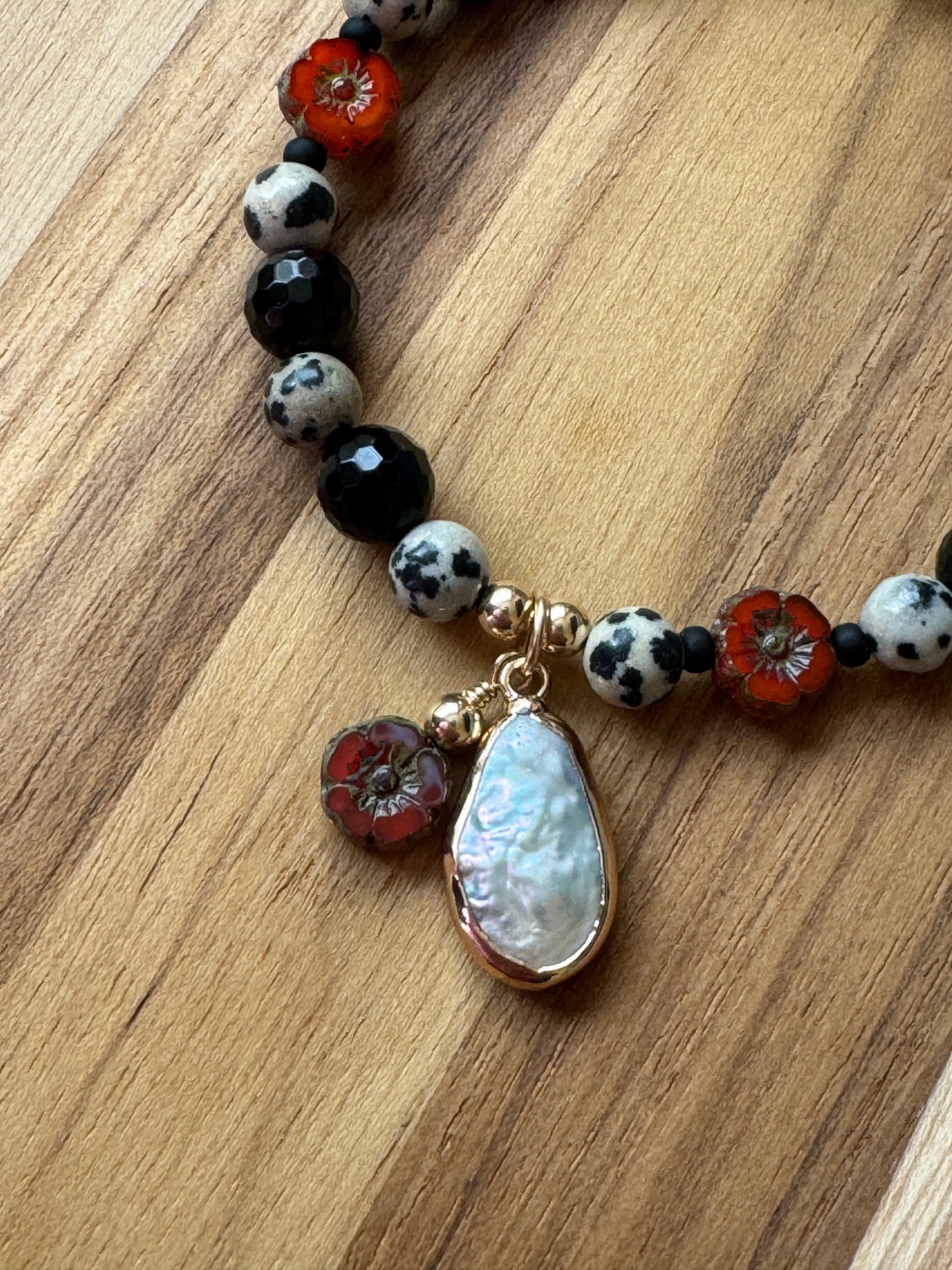 Dalmatian Jasper and Black Onyx Stretch Beaded Bracelet with Baroque Pearl and Red Flower Dangles