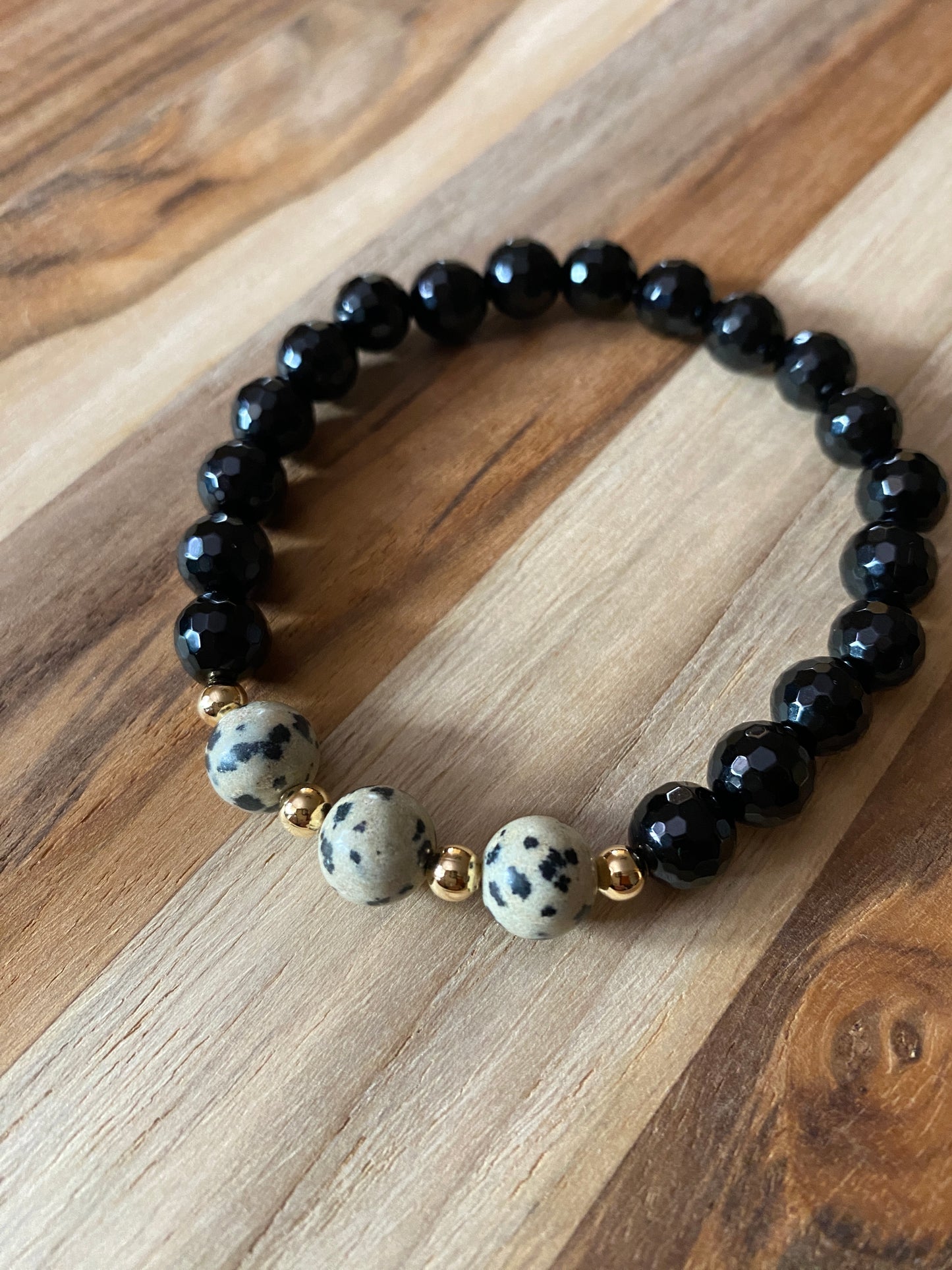 Faceted Black Onyx Beaded Stretch Bracelet with Dalmatian Jasper Beads