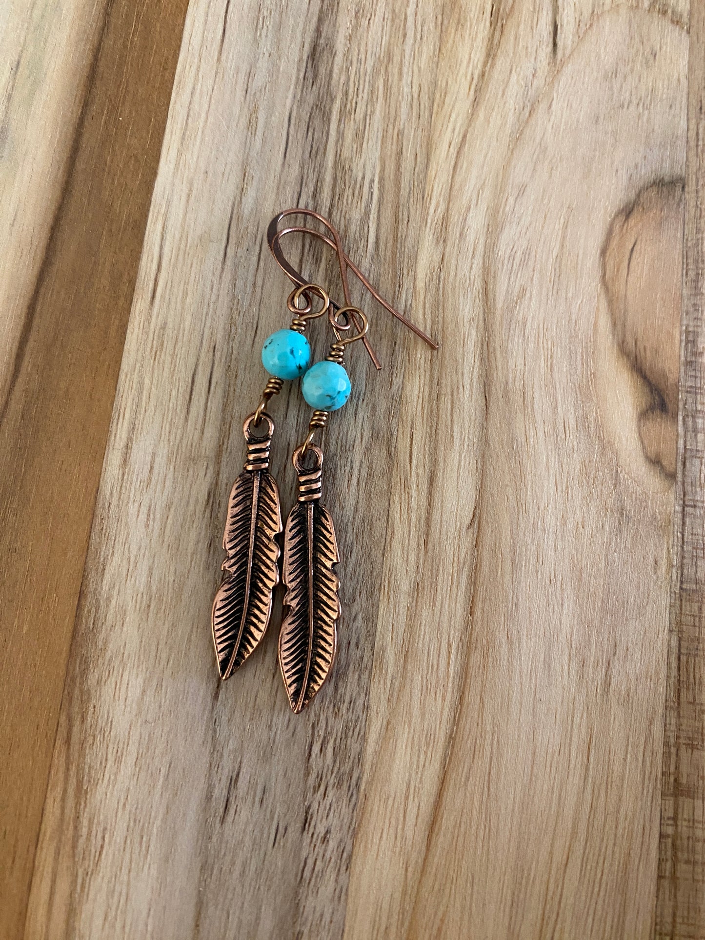 Antique Copper Feather Dangle Earrings with Faceted Turquoise Bead